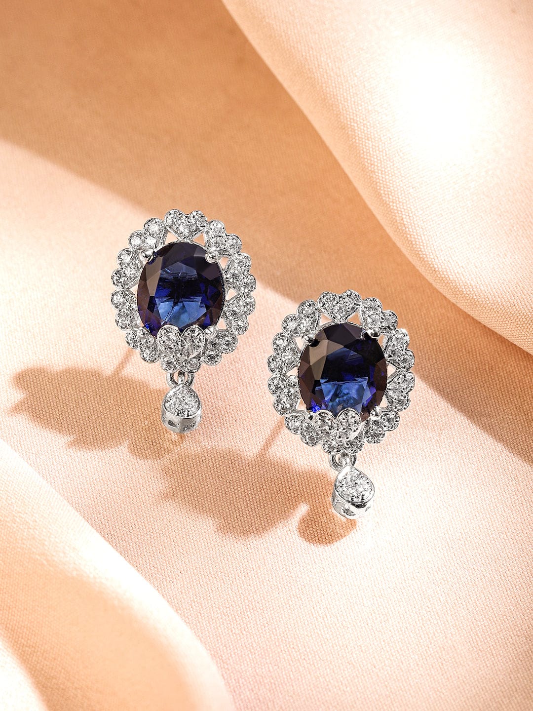 Rhodium-Plated Blue Sapphire & White Cubic Zirconia Studded Oval Statement Earrings with Drop Detailing